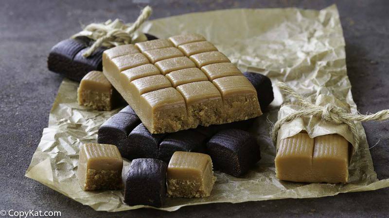 Homemade Fannie Mae caramels on parchment paper.