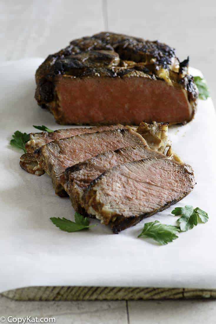 bourbon street steak on a cutting board