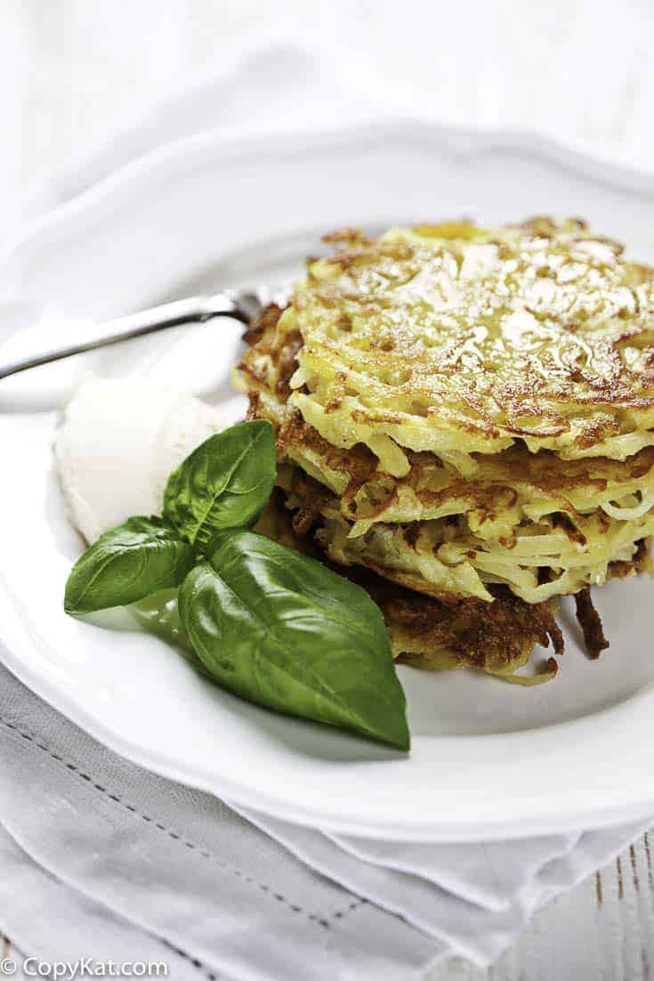 a stack of potato pancakes on a plate