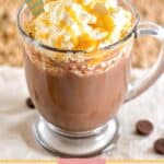 a cup of dunkin hot chocolate with a spoon