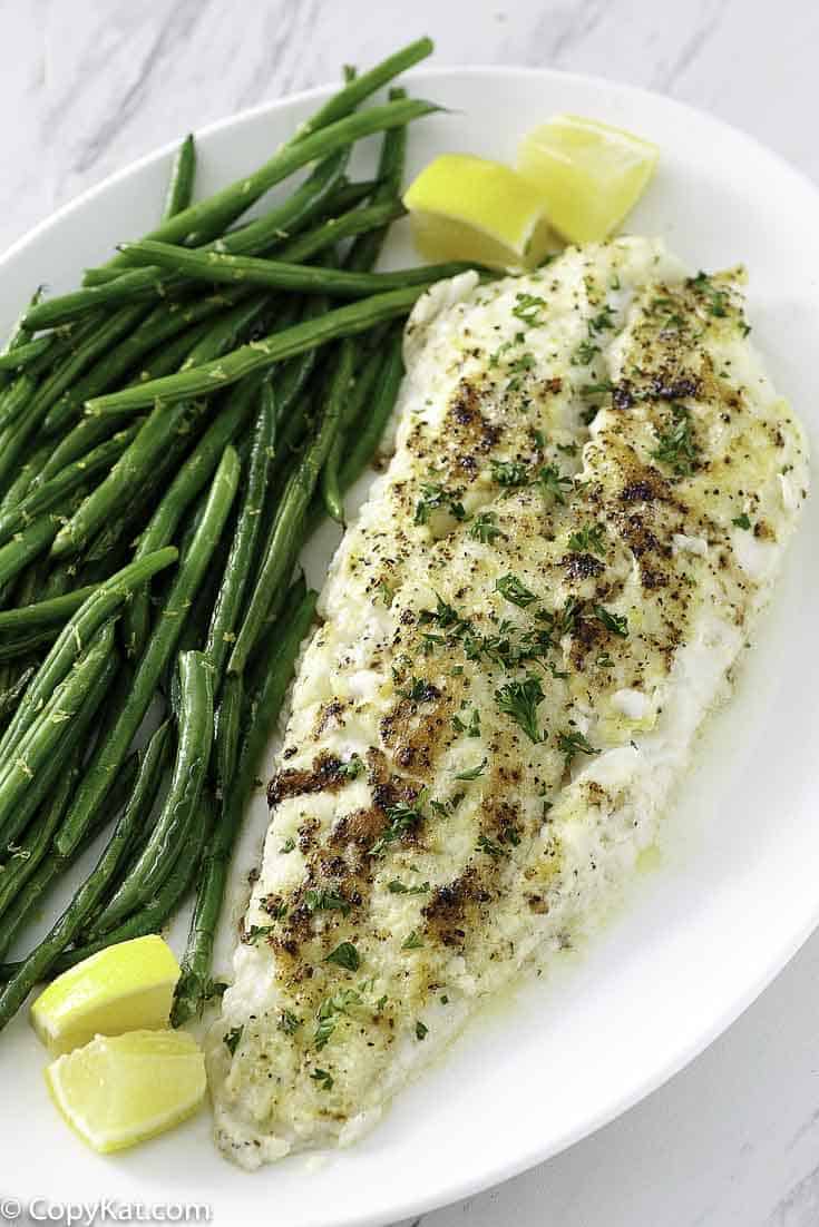 baked white fish on a plate