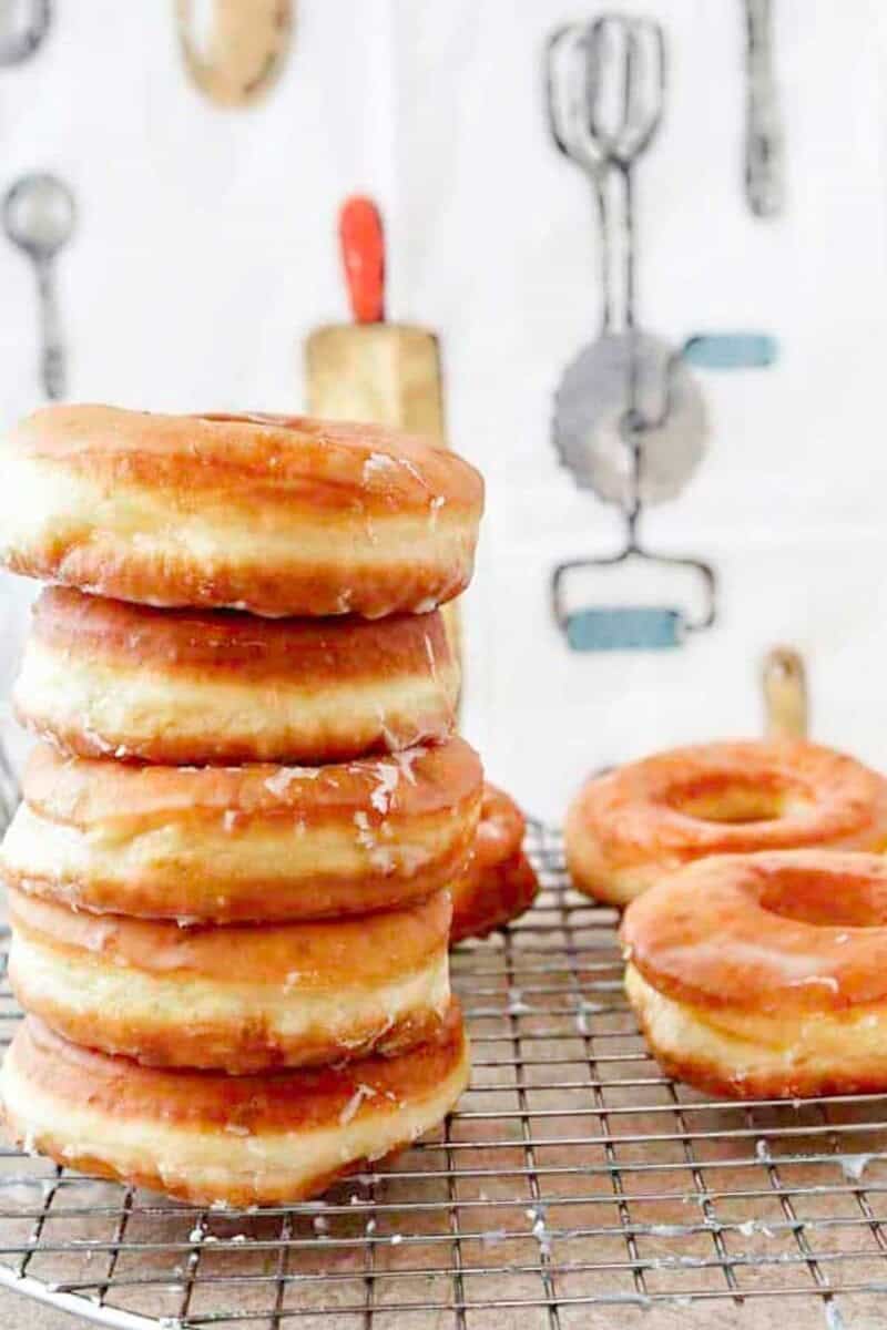 A stack of homemade Krispy Kreme glazed donuts.