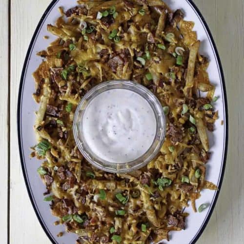 Homemade Cheddar's Texas Cheese Fries with ranch dip