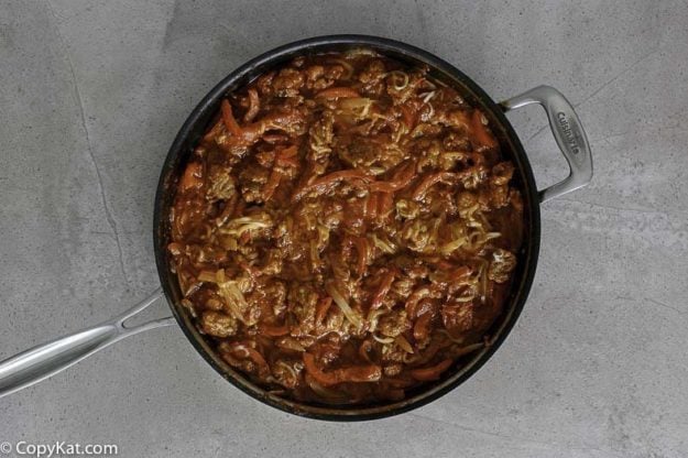 Italian sausage and peppers in a skillet