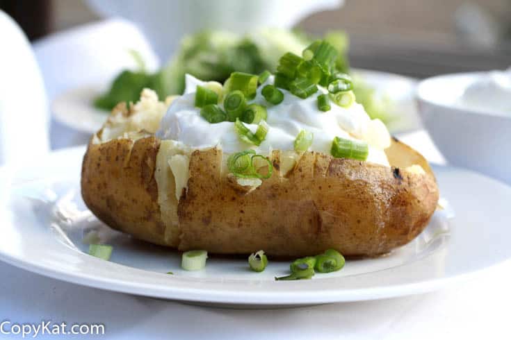 Make baked potatoes in the slow cooker, it is so easy to do.