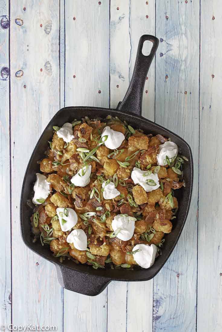 You can prepare James Coney Island Baked Tots easily with this copycat recipe. #copycat #copycatrecipe #tatertots #bakedtots #sidedish