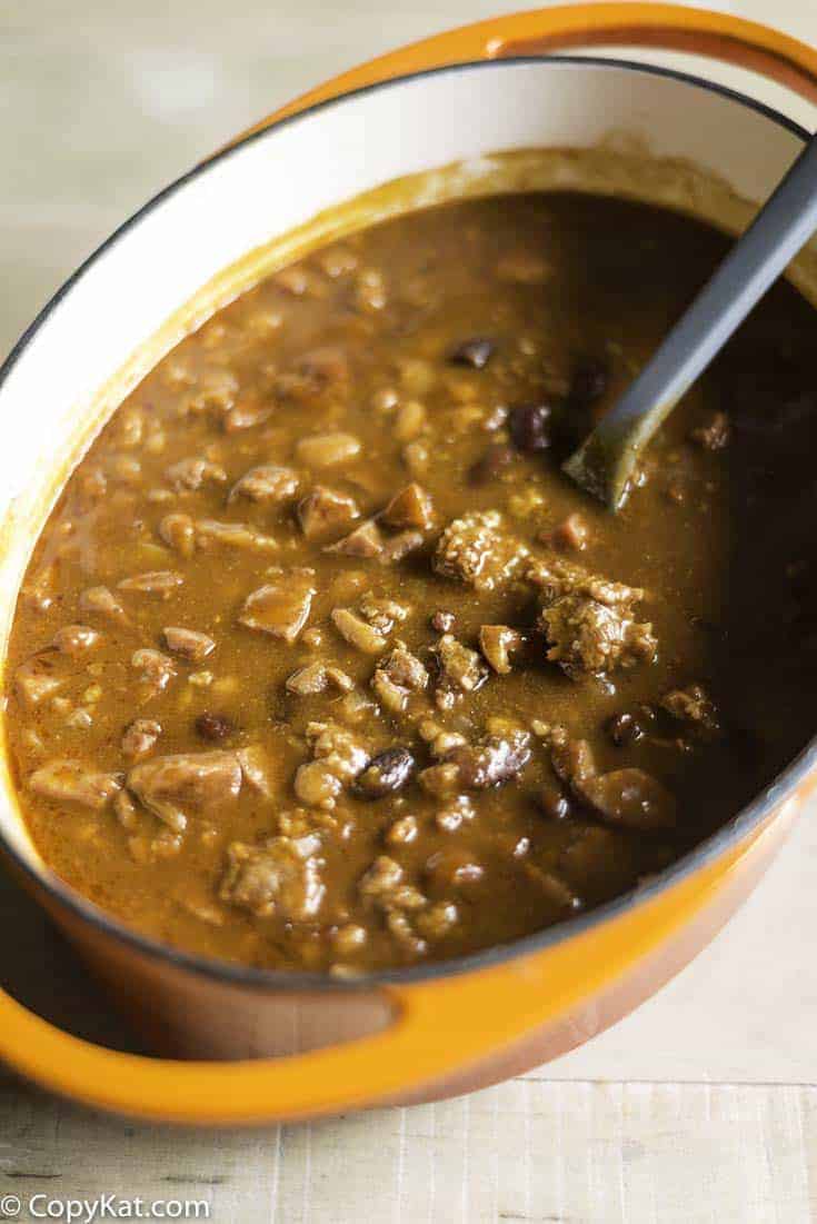 Baked Beans with Smoked Sausage in a Dutch oven