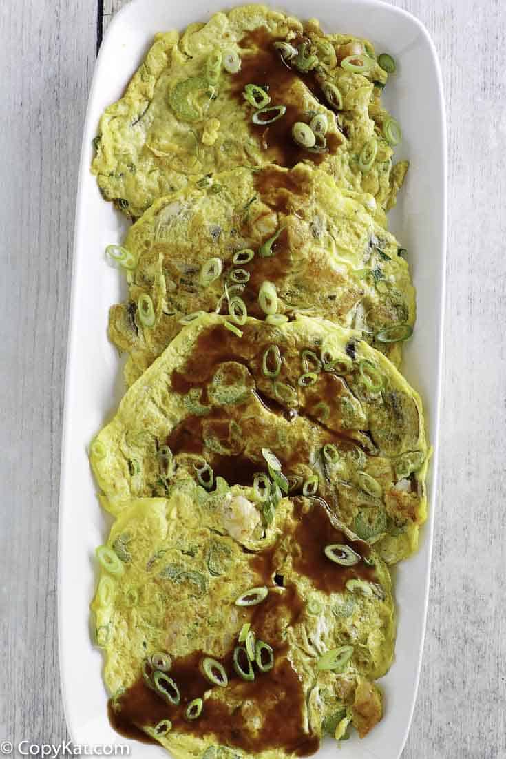 Egg Foo Young with Gravy on a serving platter.