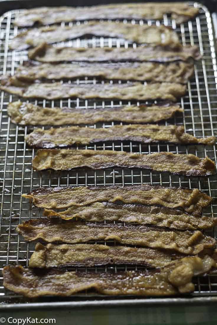 A pound of bacon that has been cooked in the oven.