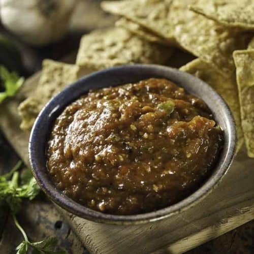 A bowl of homemade mexican hot sauce and tortilla chips