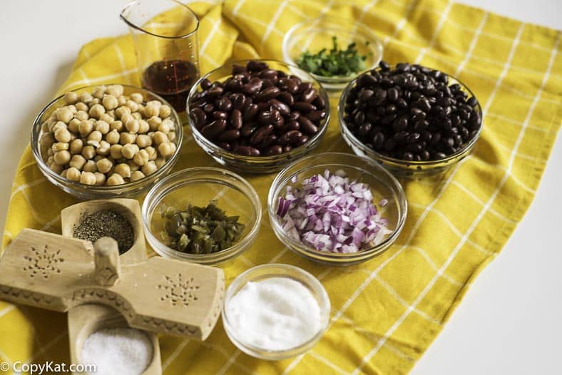 Garbonzo beans, red kidney beans, black beans, red onions, pickled jalapenos and more