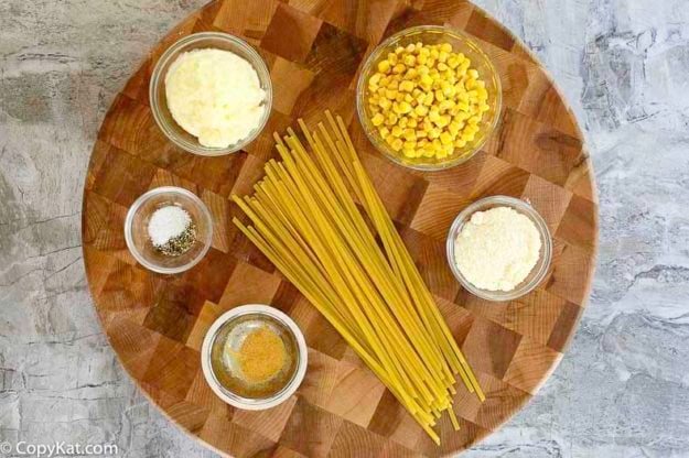 Ingredients for Fettuccine Salad: fettuccine, mayonnaise, parmesan cheese, corn, garlic powder, and more