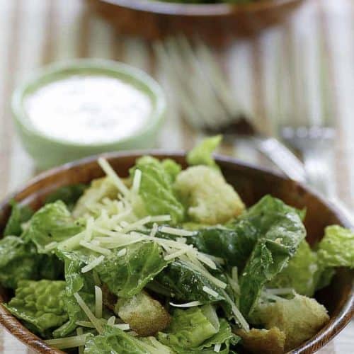 Homemade copycat Outback Steakhouse caesar salad served with homemade caesar salad dressing