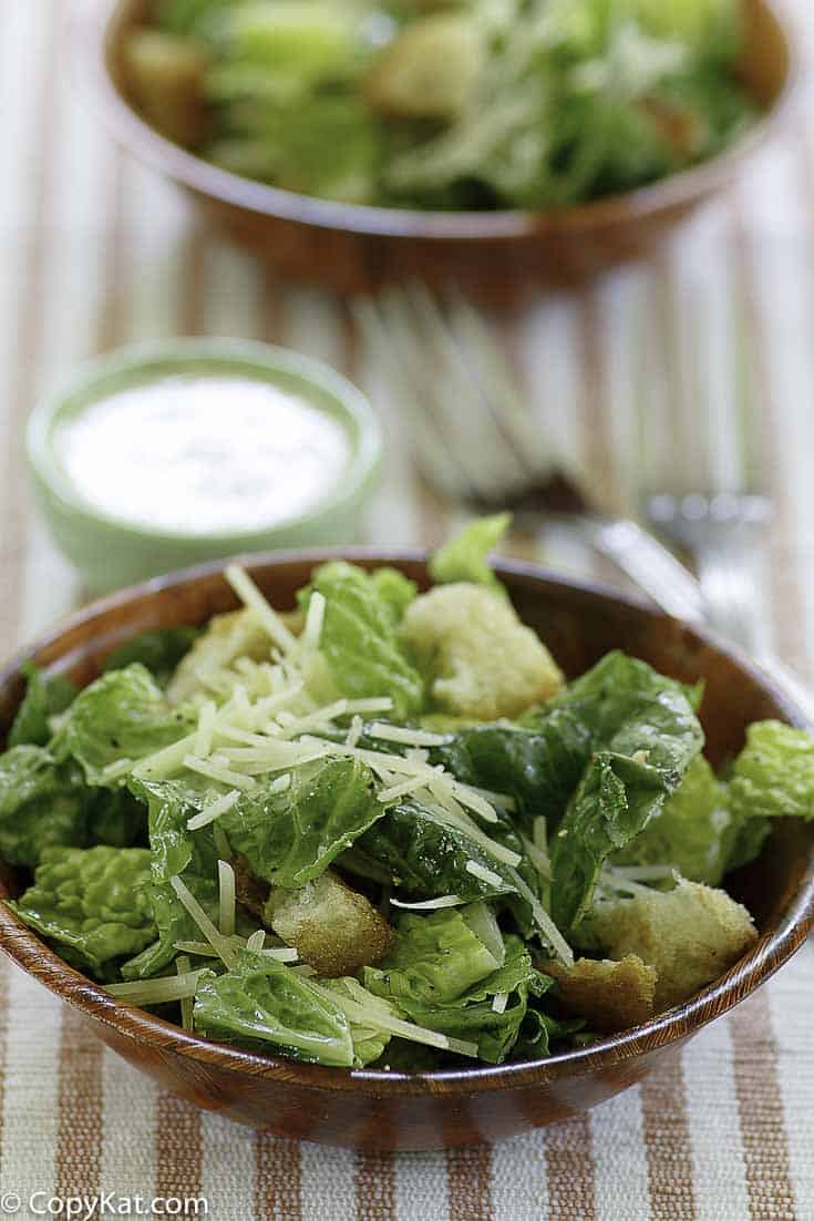 Homemade copycat Outback Steakhouse caesar salad served with homemade caesar salad dressing