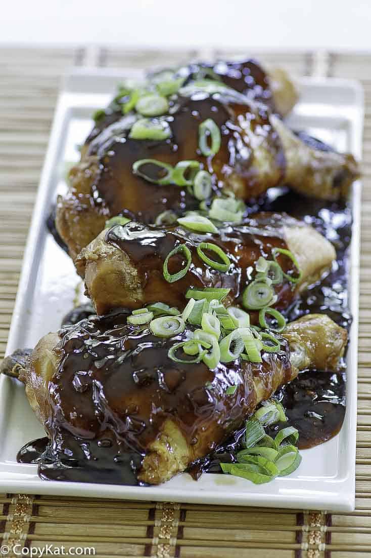 chicken shoyu with green onion slices on top