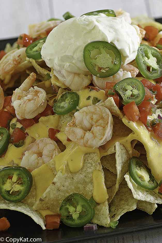 Nachos with cheese, jalapeno peppers, and shrimp