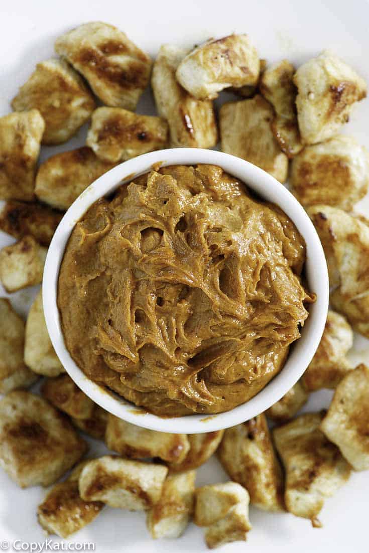 a bowl of homemade yum-yum sauce with grilled chicken