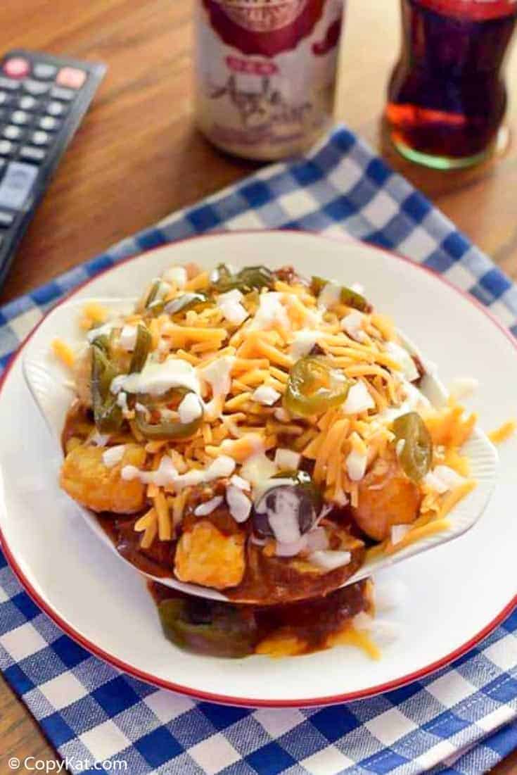 loaded tater tots on a plate