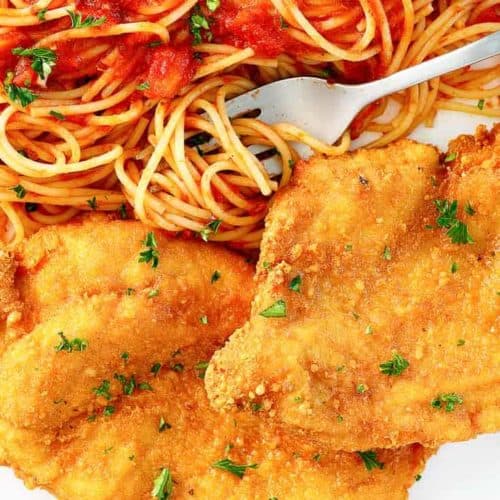 Romano cheese crusted chicken and pasta with marinara