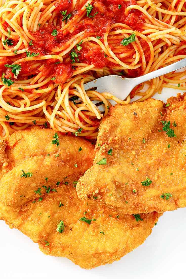 Romano cheese crusted chicken and pasta with marinara