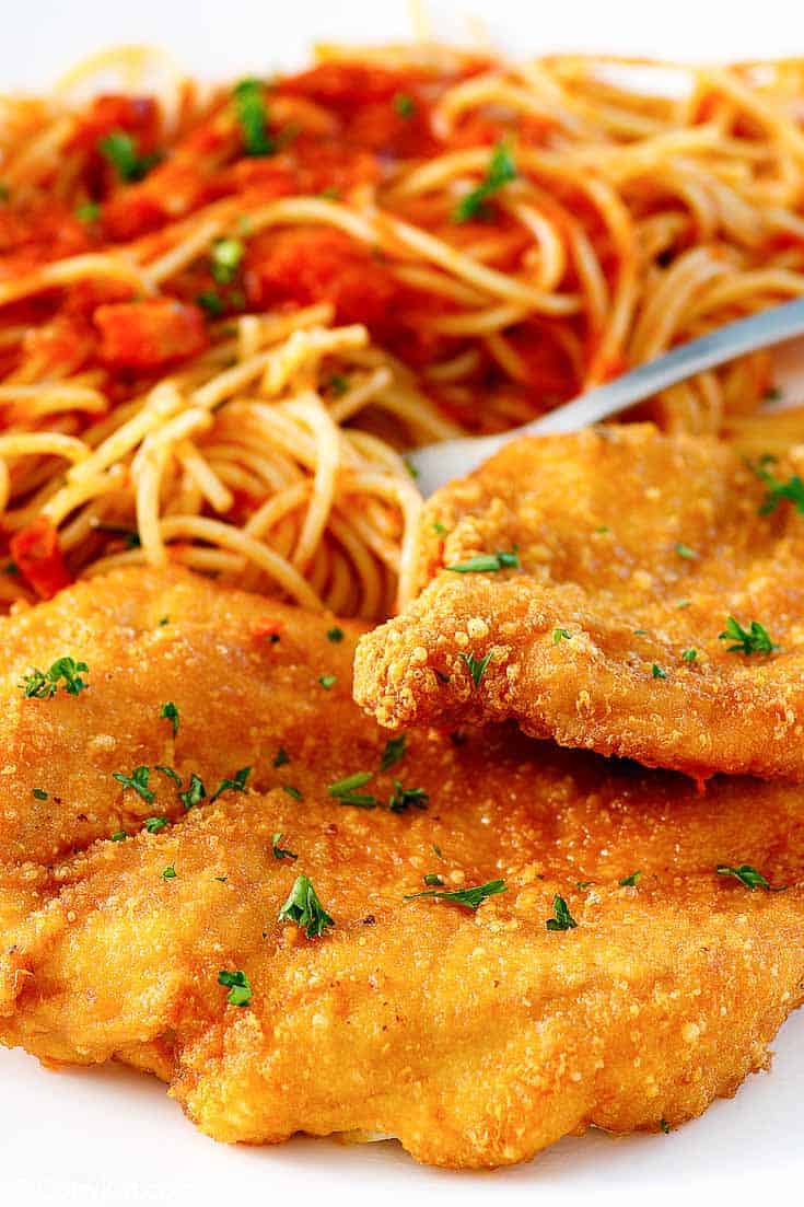 Romano crusted chicken and pasta with marinara sauce