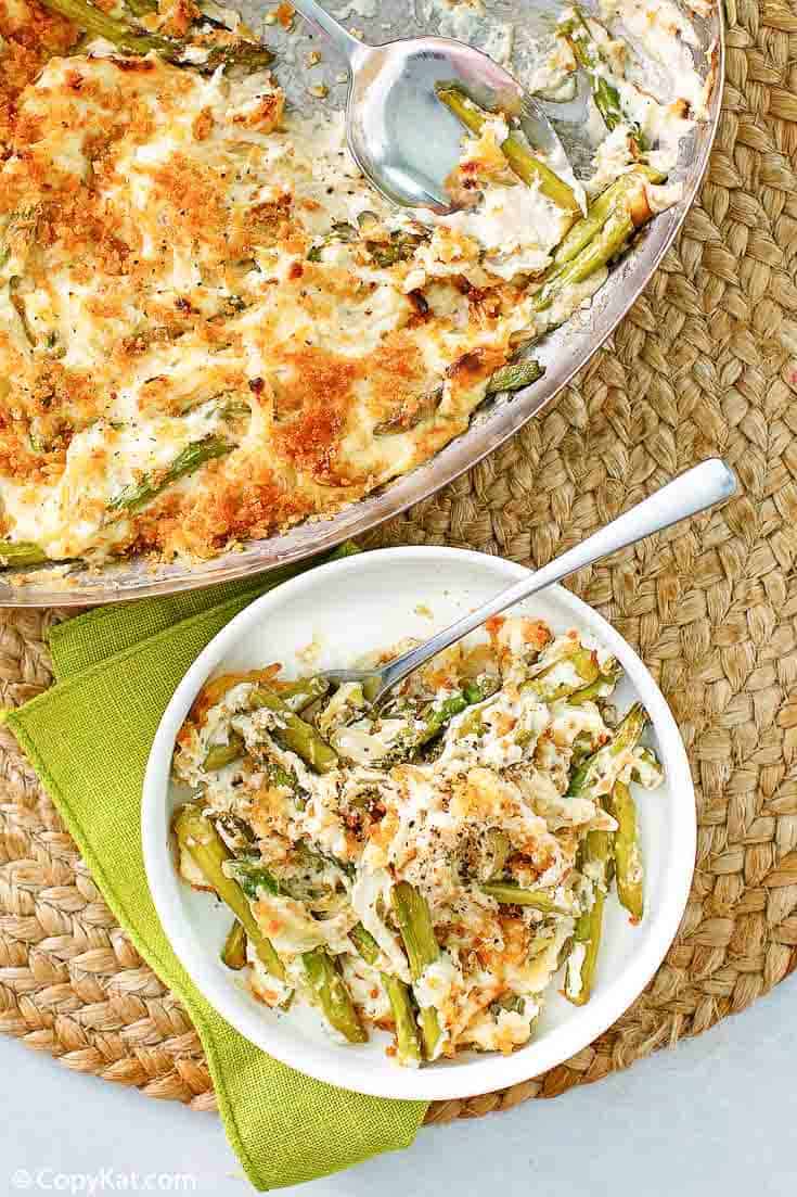 Swiss asparagus casserole in a skillet and a bowl