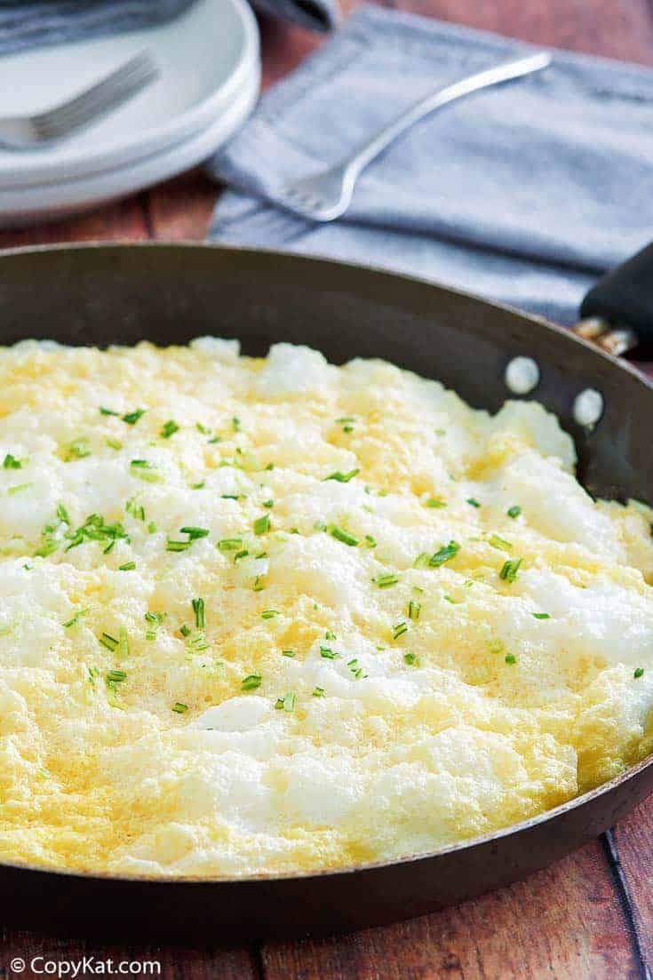 fluffy omelette in a non-stick skillet