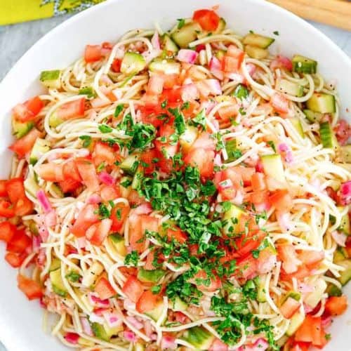 homemade Luby's spaghetti salad in a white serving bowl