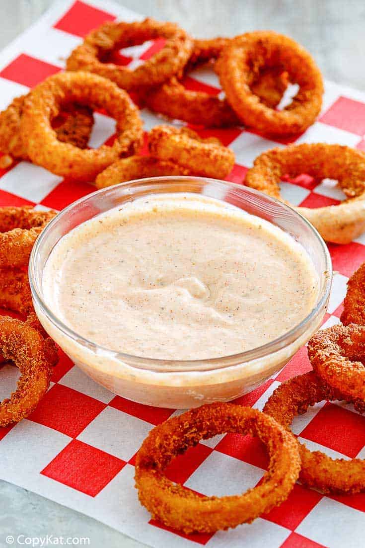 homemade Outback bloomin onion dipping sauce with onion rings