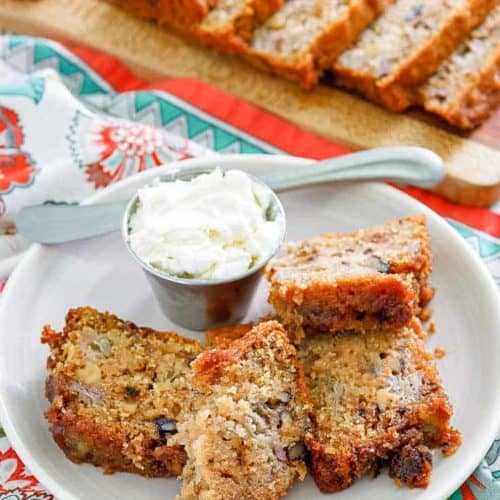 slices of rhubarb bread on a plate and cutting board