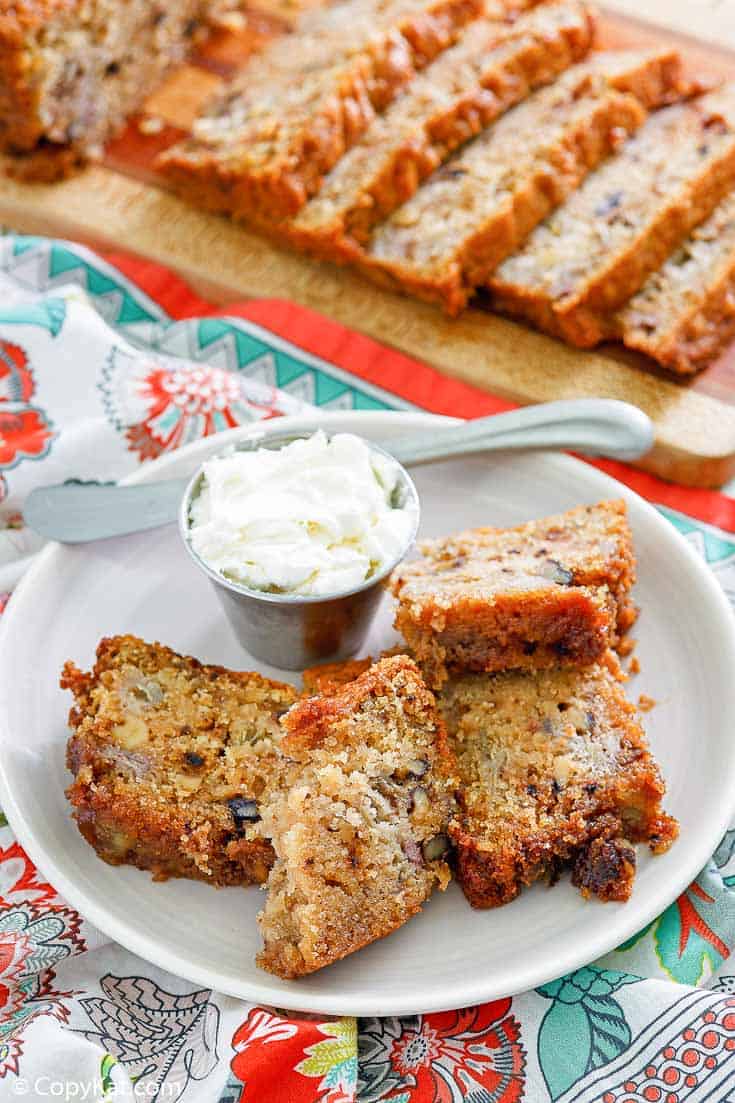 slices of rhubarb bread on a plate and cutting board