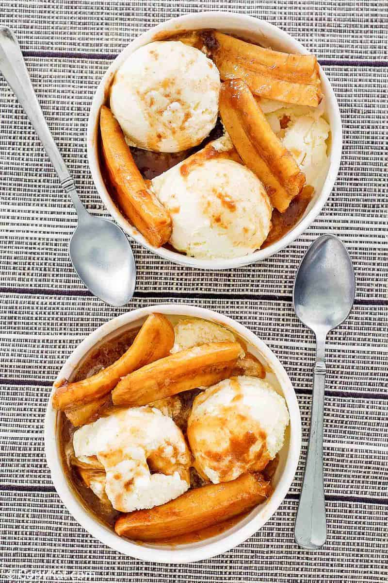 overhead view of two bowl of bananas foster dessert