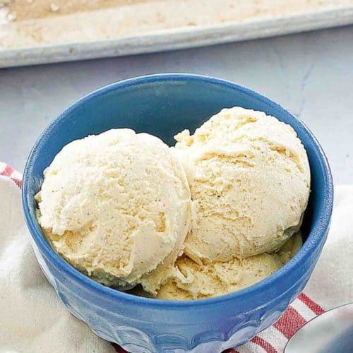 the scoops of cake batter ice cream in a blue bowl