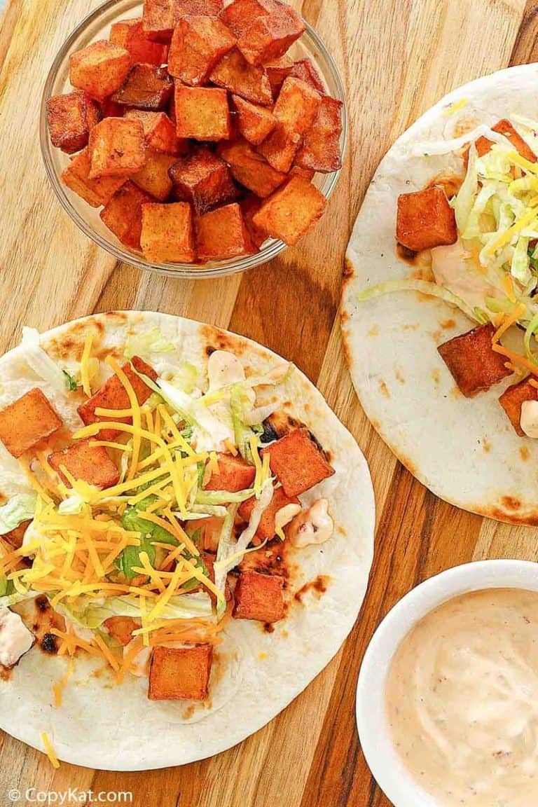 Homemade Taco Bell Spicy Potato Taco, chipotle sauce, and spicy fried potatoes