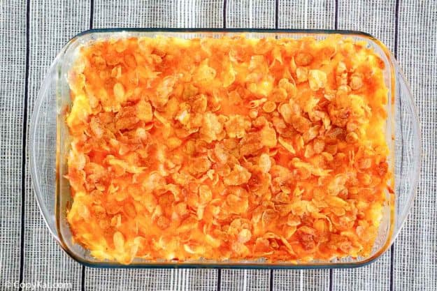 cheesy hash brown potato casserole in a baking dish