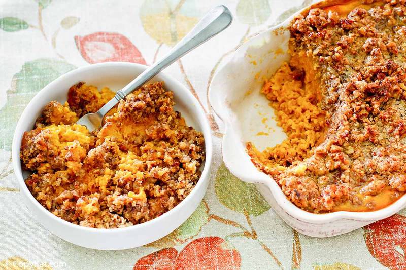 sweet potato casserole with pecan topping in a baking dish and bowl