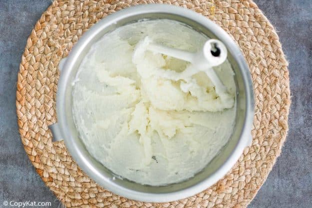 whipped cream cheese and shortening in a mixing bowl