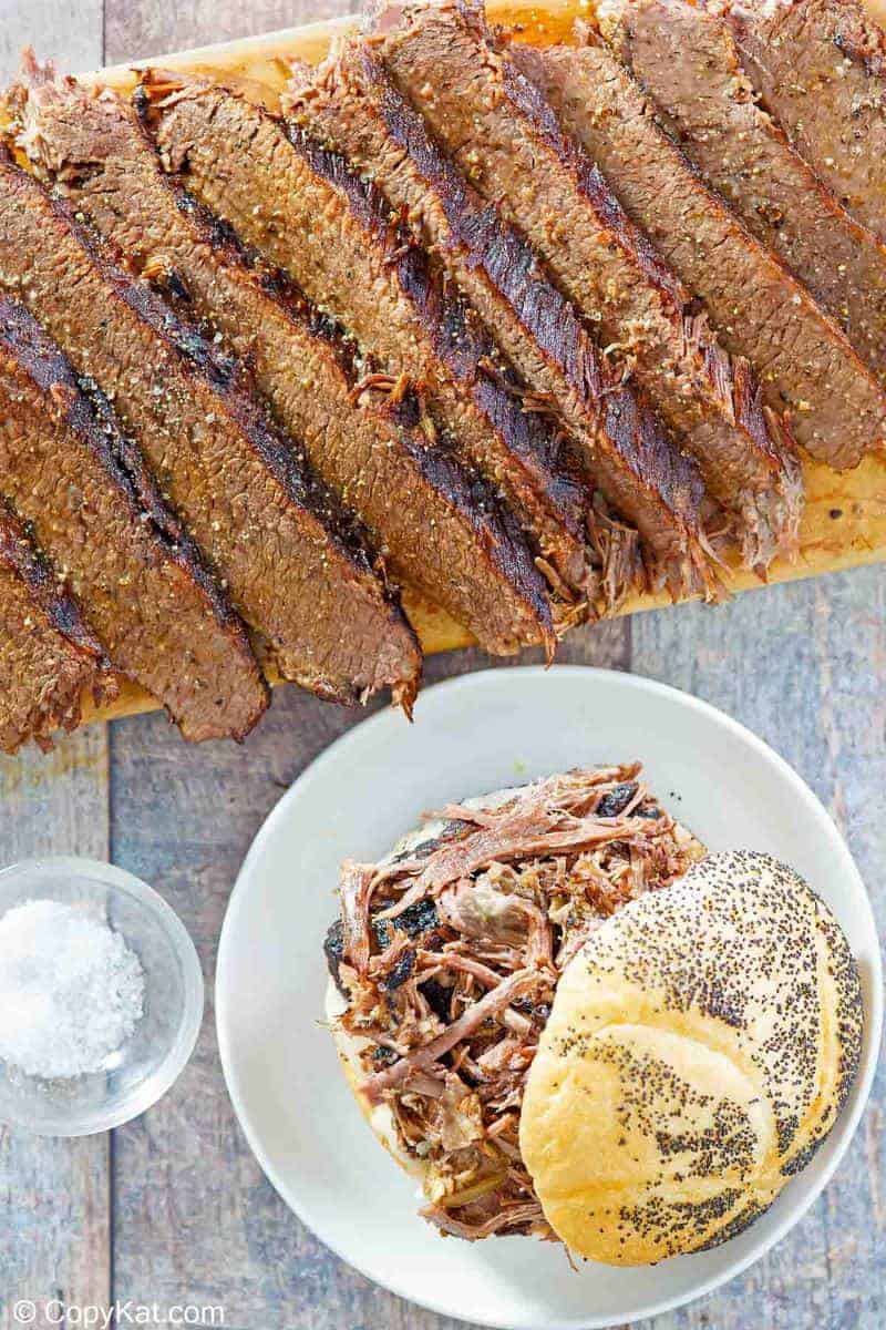 overhead view of brisket slices and sandwich