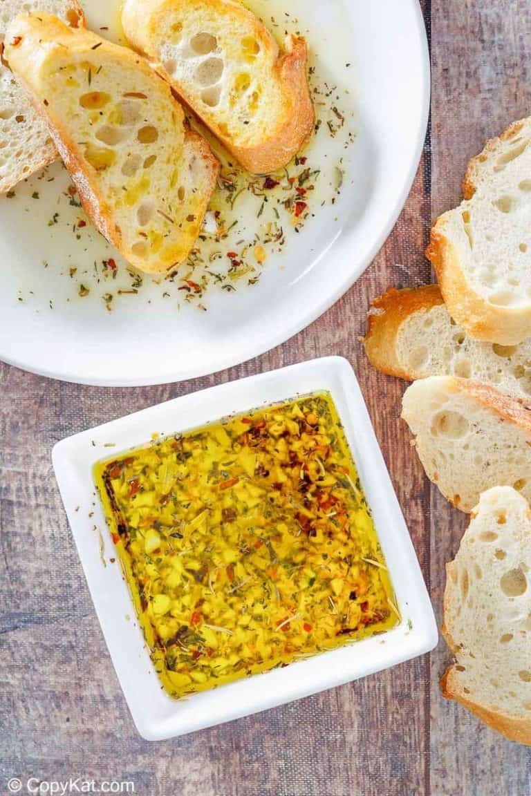homemade Carrabba's Italian Butter Spicy Sicilian Dipping Sauce and bread slices