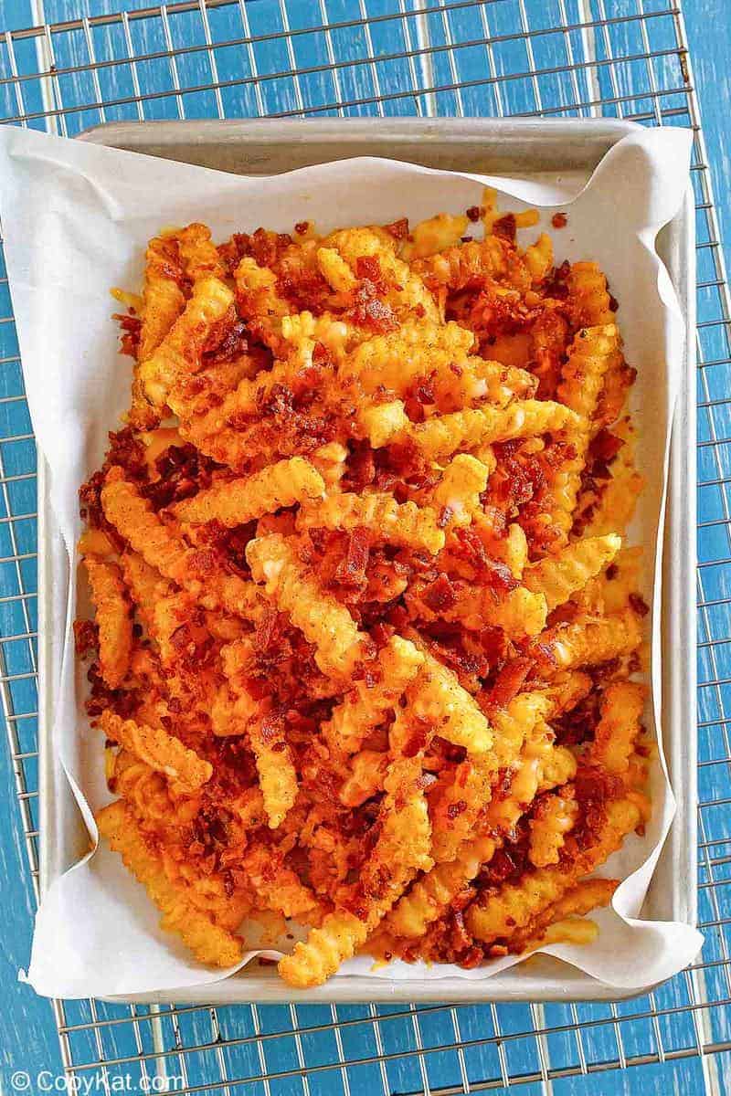 Homemade Outback Steakhouse Aussie Fries on a baking sheet