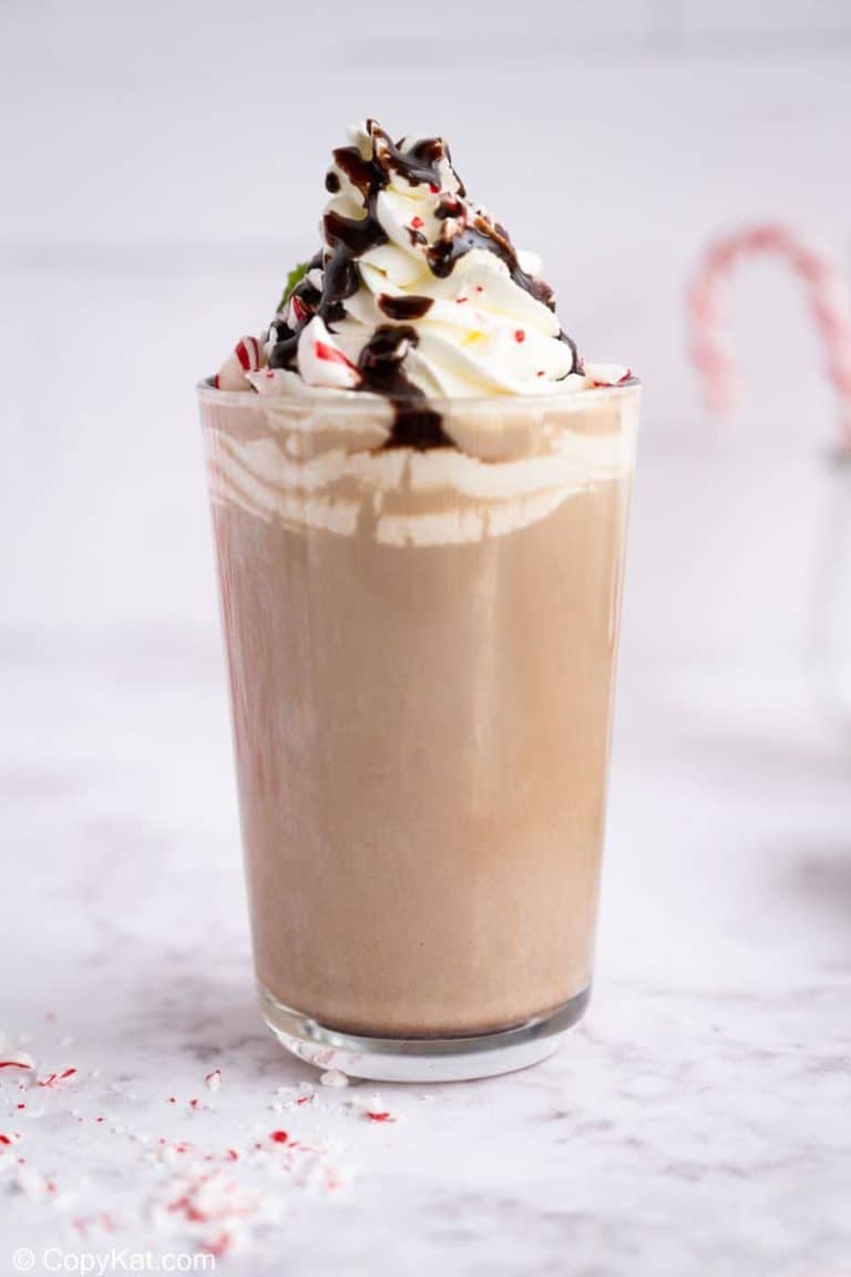 homemade Starbucks Peppermint Mocha with whipped cream, chocolate syrup, and peppermint candy