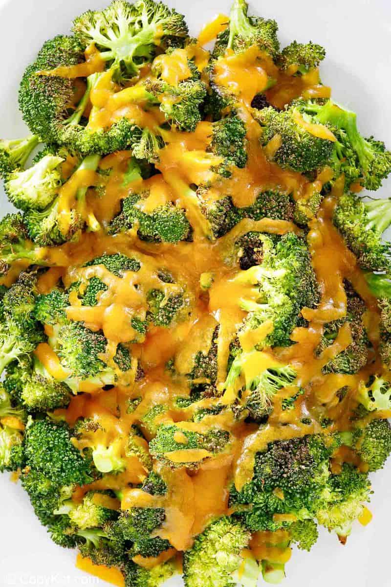 overhead view of Keto oven roasted broccoli and cheese on a platter