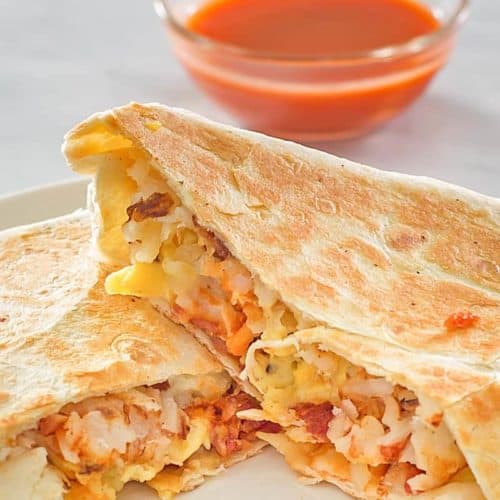 homemade Taco Bell Breakfast Crunchwrap and taco sauce