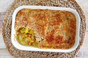 yellow squash casserole in a baking dish