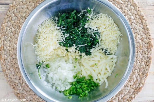 ingredients for homemade Cheddars Santa Fe spinach dip in a bowl