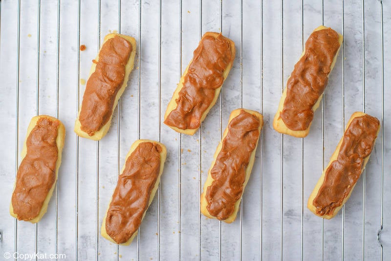 caramel filling on baked cookies for homemade Twix bars