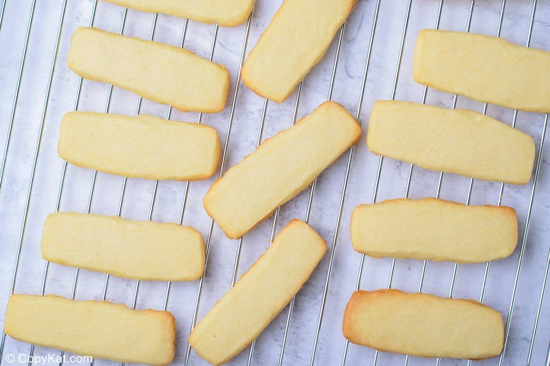baked cookie dough strips for homemade Twix bars on a wire rack