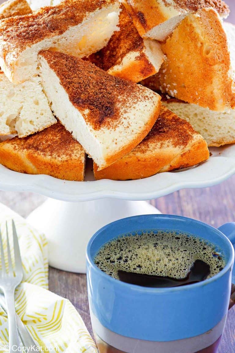 slices of old fashioned coffee cake and a cup of coffee