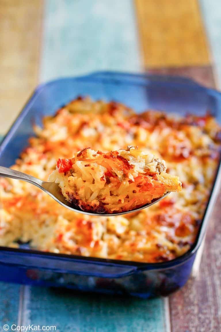 homemade Cracker Barrel loaded hash brown casserole on a spoon