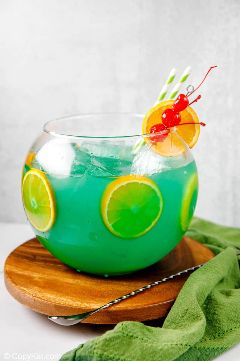 Homemade Bennigan's Paddy 'O Punch cocktail on a round wood coaster.